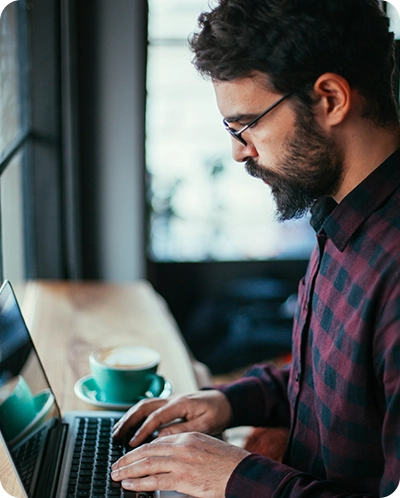 man looking at computer